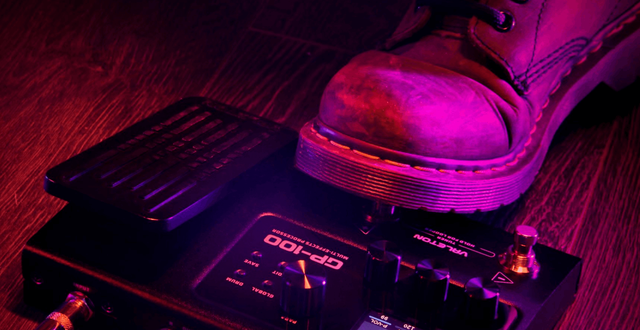 a person stepping on a valeton effects pedal